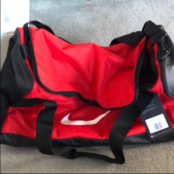 red and black nike bag